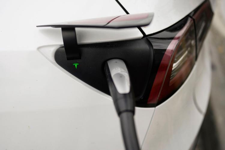 With GM and Ford embracing Tesla's EV charging technology, here's what it  means for consumers