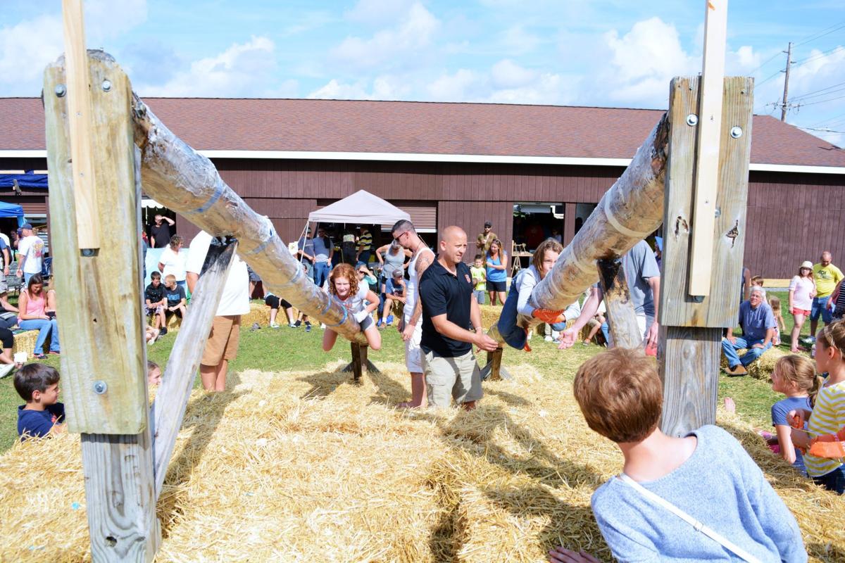 70th annual Jordan Fall Festival closes with greased pole climb, car