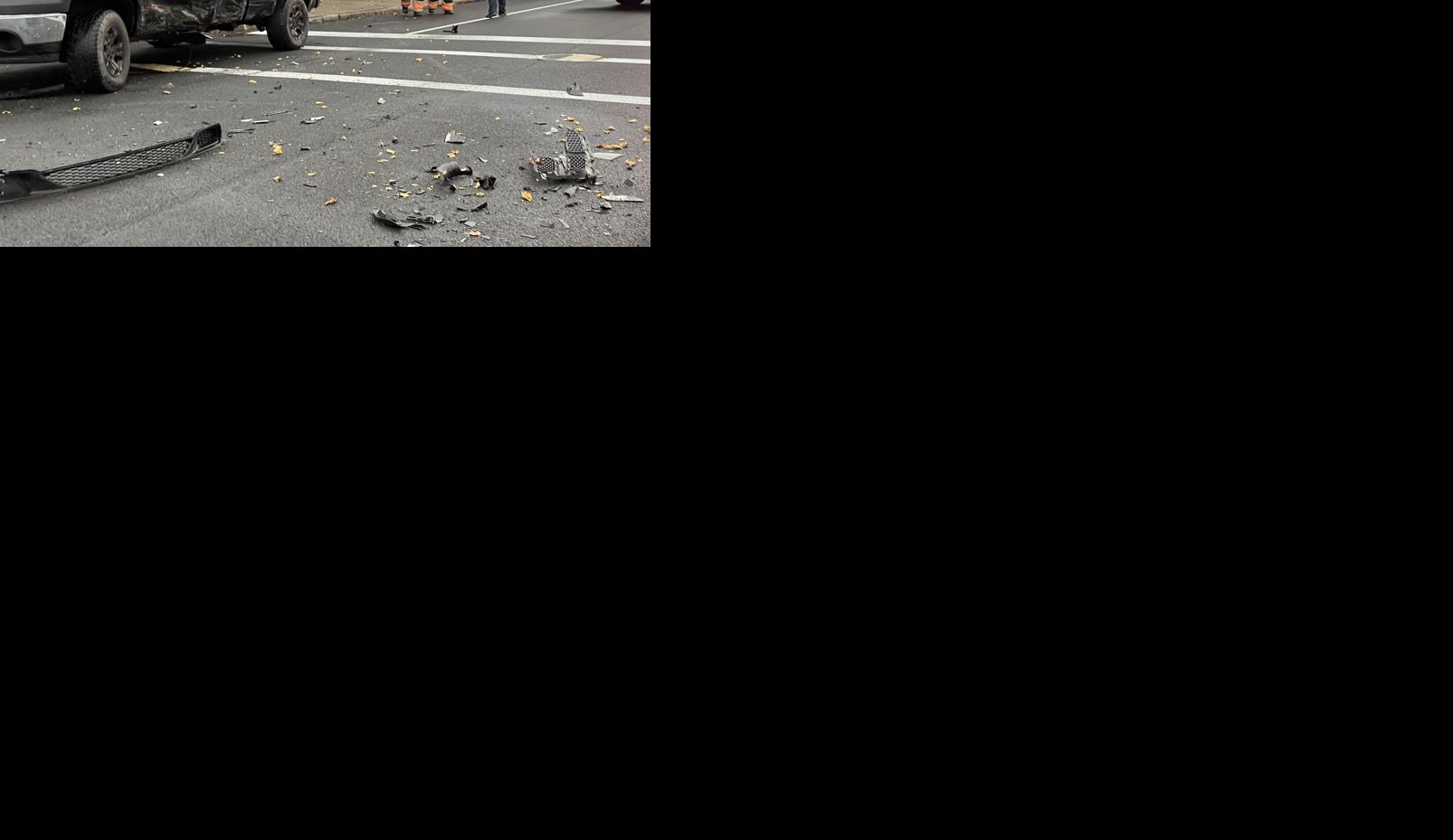 Twovehicle accident sends minivan crashing into Genesee Street