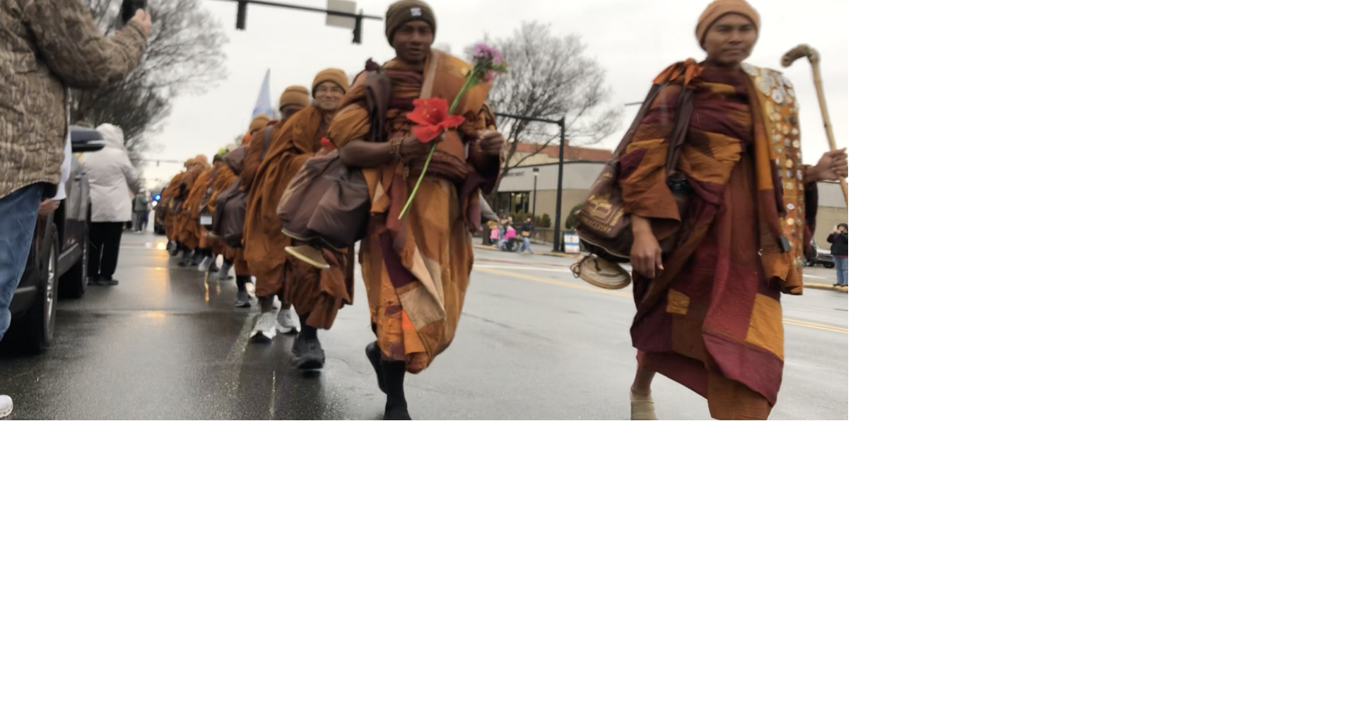 Avery County residents intercept Buddhist Walk for Peace with dogs at heels