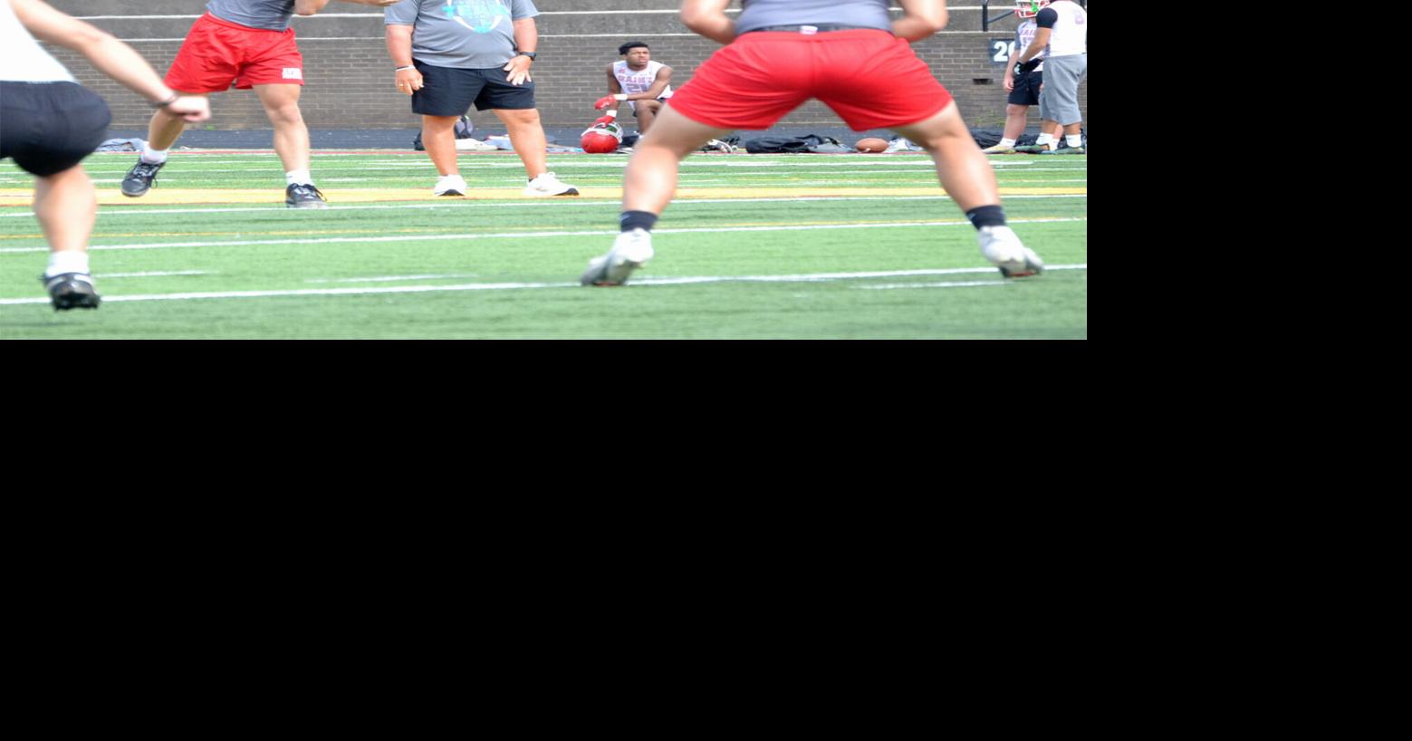 Quarterback Hudson Manis connects on a pass to Tucker Houston during an FCA Team Camp 7-on-7 matchup against Draughn last week in Hickory.jpg