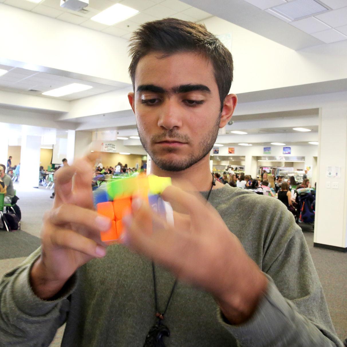 A Blur Of Hands Exchange Student Moez Boussarsar Among Top Exchange Student Moez Boussarsar Among