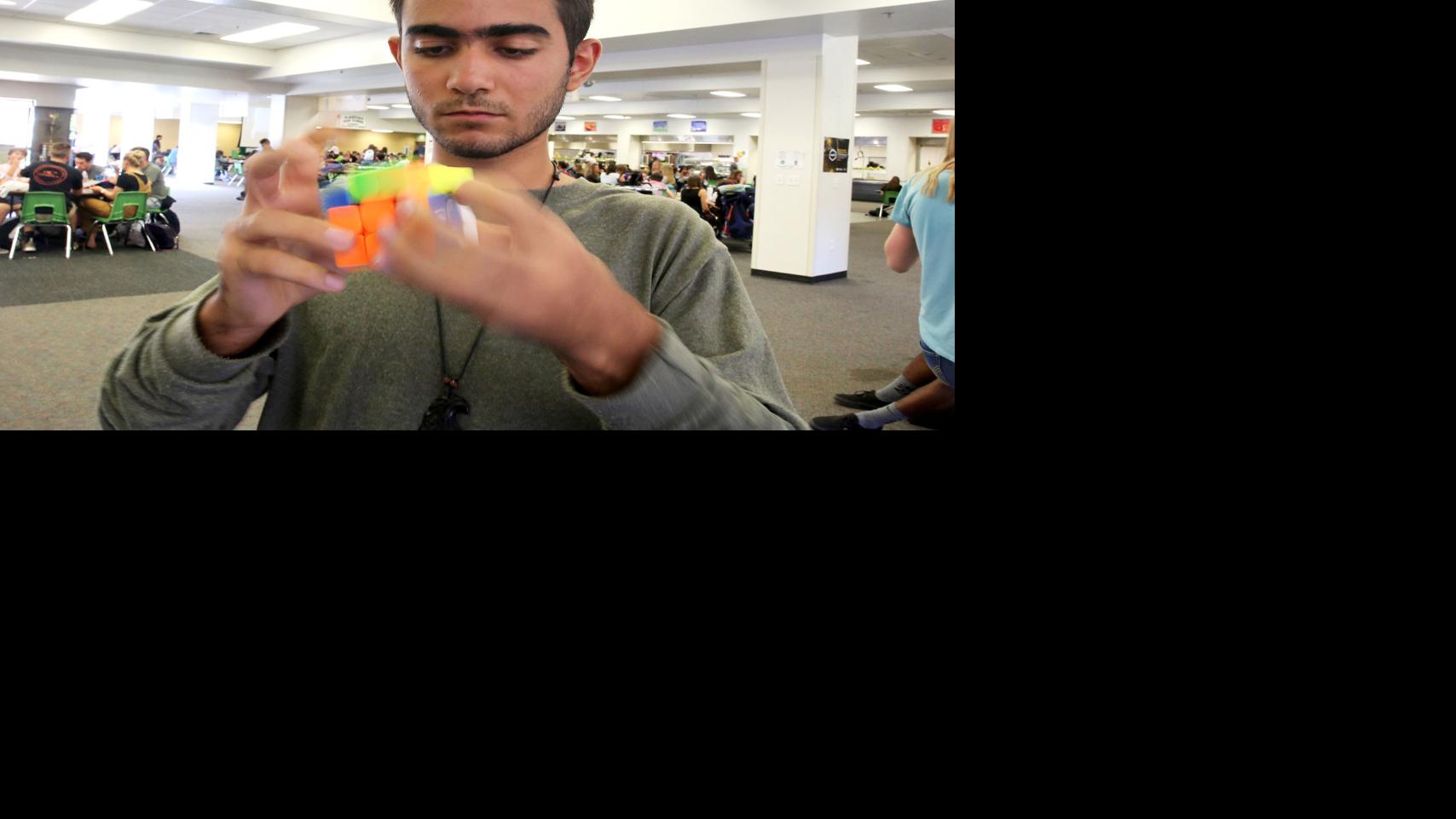 A blur of hands: Exchange student among top Rubik's Cubers in the world