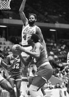 1982: Houston Rockets center Moses Malone grabs NBA-record 21 offensive rebounds