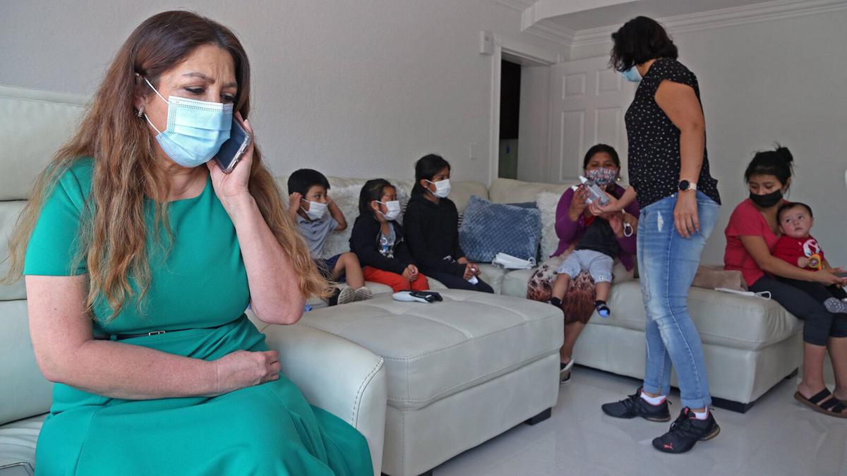 MOMS-MIGRANTFAMILIES-REUNITE-MI