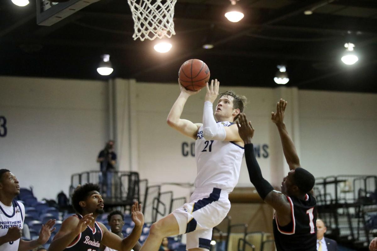 Five Players Hit Double Figure Scoring In Nau S 93 56 Home Win