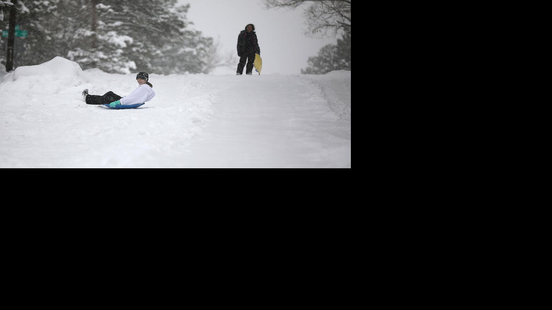 Snowfall causes high school sports cancellations