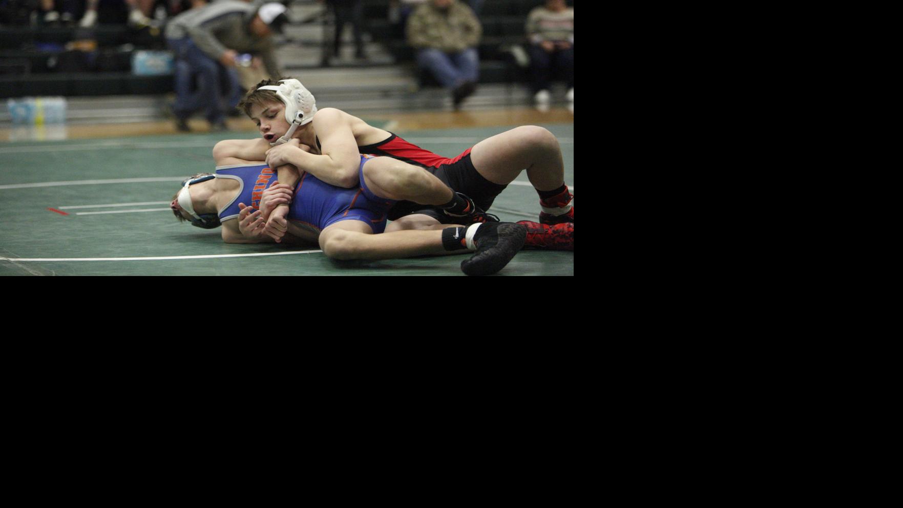 Two Page wrestlers win titles at D-III state tourney, two medal for Coconino