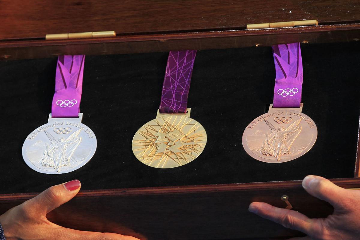Here S A Look At Every Olympic Gold Medal Design Since 2000 Olympics Azdailysun Com