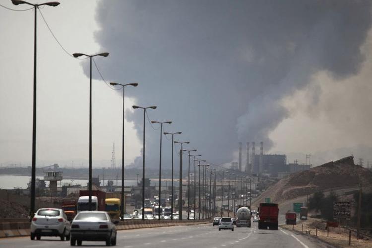 Smoke from the explosion is seen at the Shahid Rajaee port in Bandar Abbas