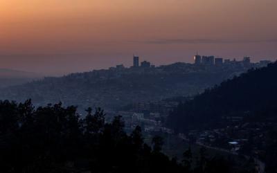 FILE PHOTO: A general view at dawn shows part of the cityscape of Kigali