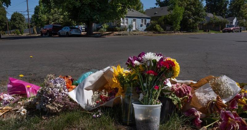Flowers decorate the intersection of Sixth and G streets in Springfield on Aug. 10, 2026, where Randall 