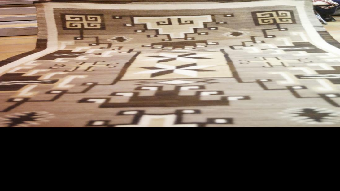 Navajo rug auction weaves culture, commerce