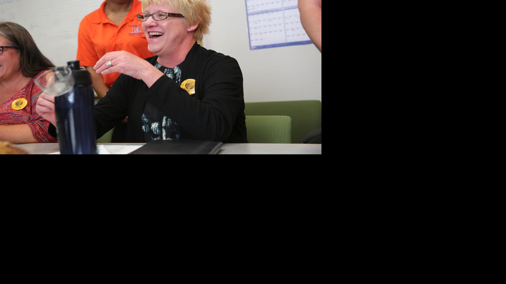 NAU students tap shuttle bus head as Homecoming Dedicatee