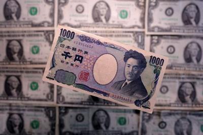 FILE PHOTO: Illustration shows Yen and U.S. dollar banknotes