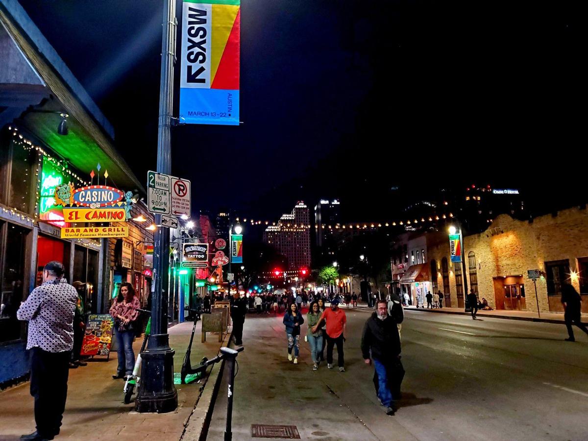 Even after Austin's mayor effectively canceled the South by Southwest festival, people still flocked to downtown Sixth Street.