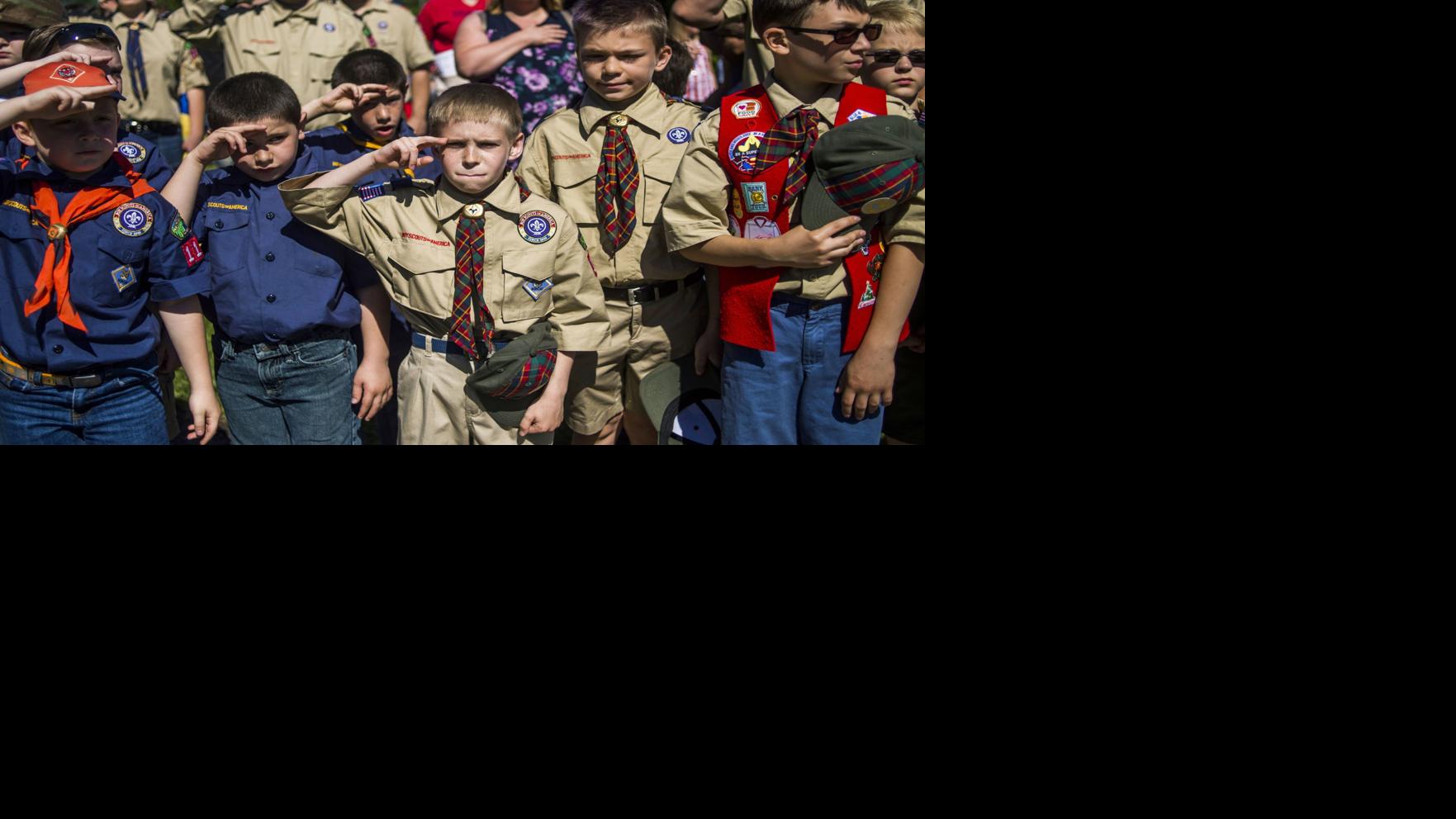 In historic change, Boy Scouts to let girls into some programs