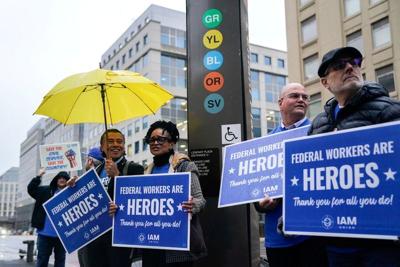 Rally in support of federal workers outside the L'Enfant Plaza Metro Station in Washington