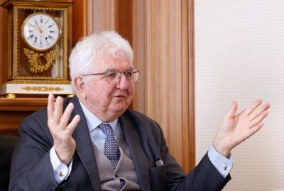 European Central Bank policymaker Robert Holzmann gestures in Vienna