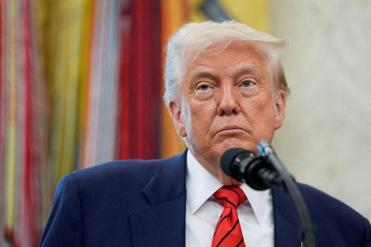 FILE PHOTO: U.S. President Donald Trump swears-in Special Envoy Steve Witkoff at the White House in Washington
