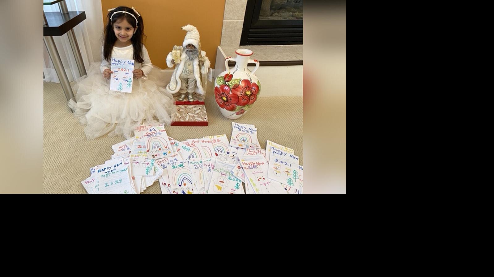 This kindergartner spent 2 weeks making 200 New Year's cards for seniors. Then she broke her piggy bank to buy them a gift