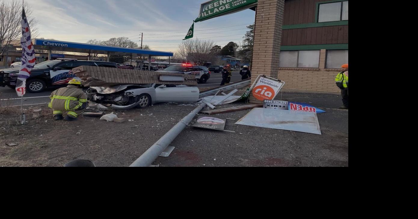 Car topples column on Fourth Street; driver OK