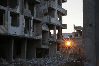 A view of a destroyed building in Jobar, on the outskirts of Damascus