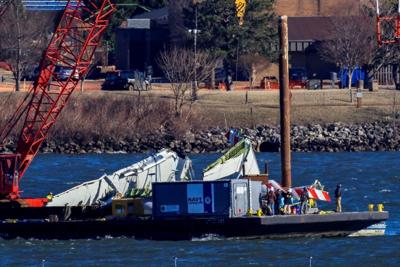 FILE PHOTO: Aftermath of American Eagle flight 5342 crash in the Potomac River near Ronald Reagan Washington National Airport