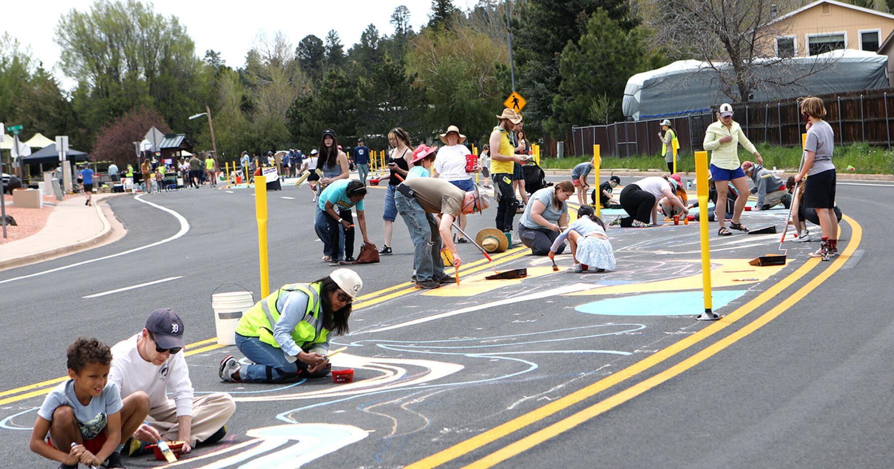 Gallery: Cheshire community picks up brushes to help in the slow street asphalt art project - Vimarsana News