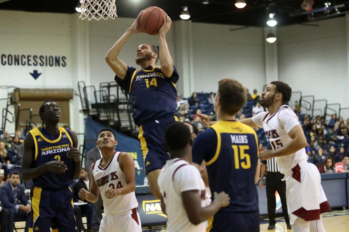 Nau Men S Hoops Rolls Past Sagu American Indian College 105 32