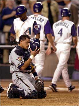 Arizona Diamondbacks' Steve Finley watches his hit leave the park