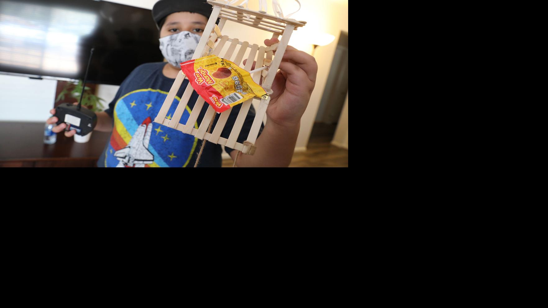 COVID-safe candy-dispensing 'contraption'