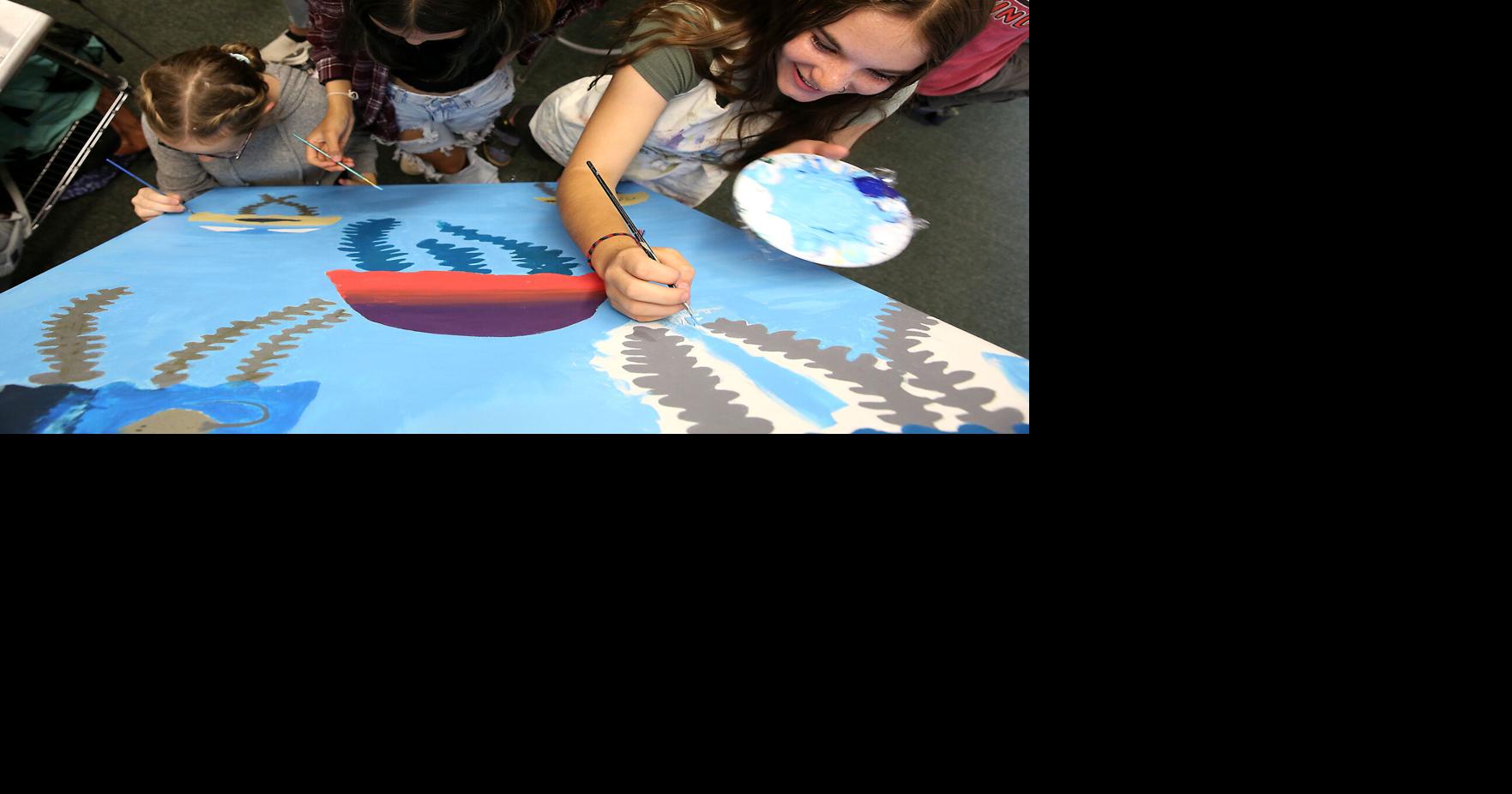 Flagstaff Junior Academy middle-schoolers paint Climate Solutions mural