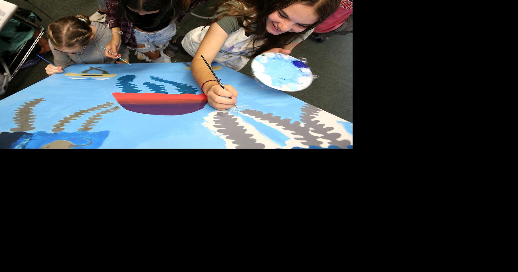 Flagstaff Junior Academy middleschoolers paint Climate Solutions mural