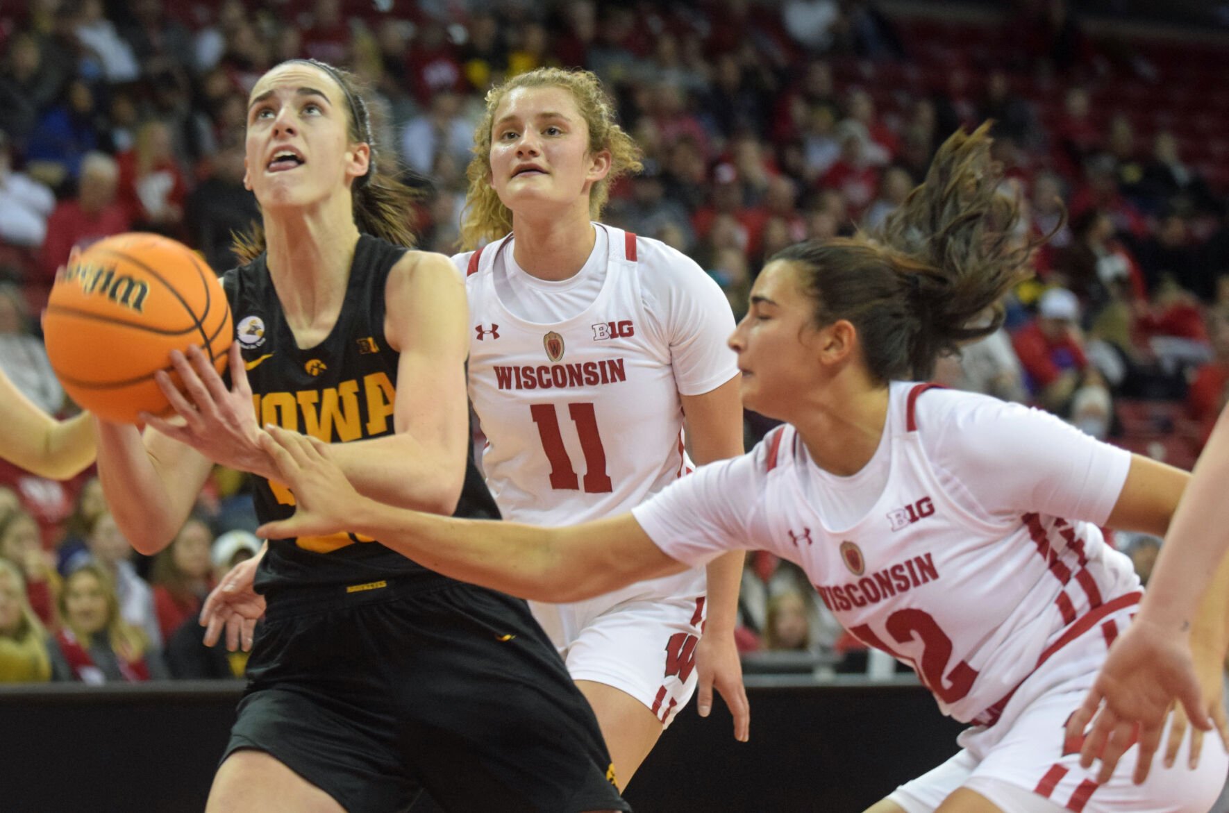 Caitlin Clark Makes History As Wisconsin Women's Basketball Loses Vs. Iowa