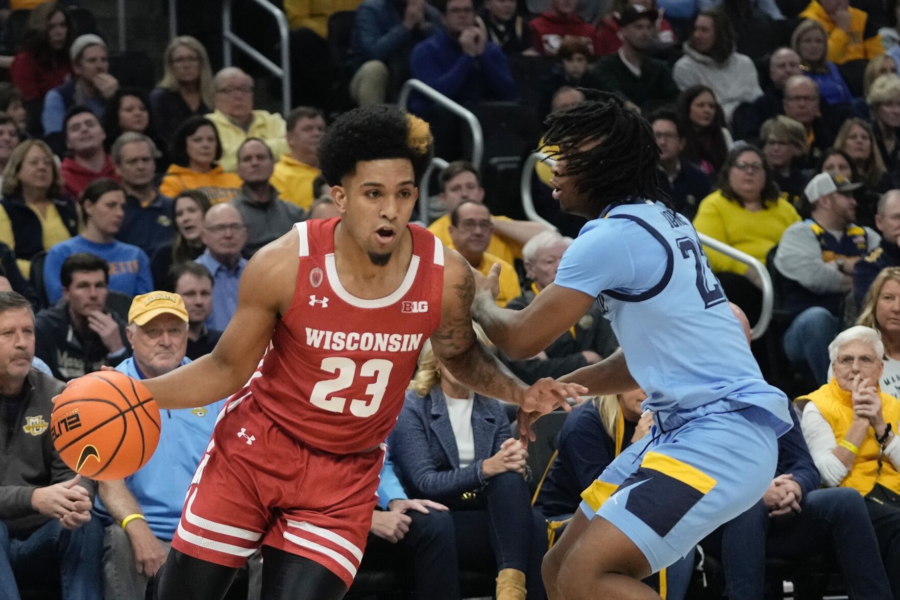 Photos: Wisconsin Men's Basketball Edges Rival Marquette In Overtime