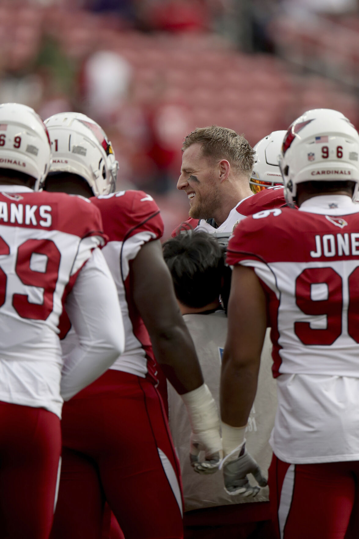 Arizona Cardinals defensive end J.J. Watt wears a shirt for Damar Hamlin  during warms up before an NFL football game against the San Francisco 49ers  in Santa Clara, Calif., Sunday, Jan. 8