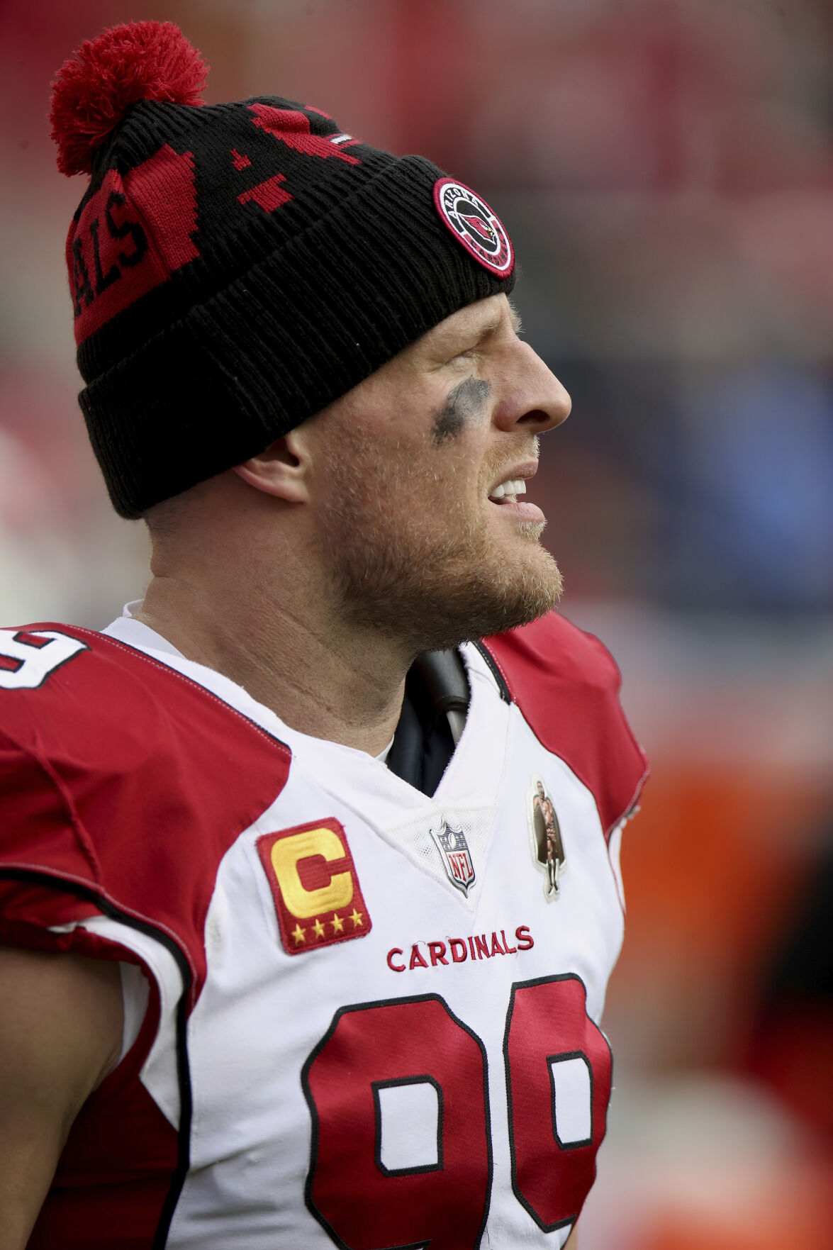 Arizona Cardinals defensive end J.J. Watt wears a shirt for Damar Hamlin  during warms up before an NFL football game against the San Francisco 49ers  in Santa Clara, Calif., Sunday, Jan. 8