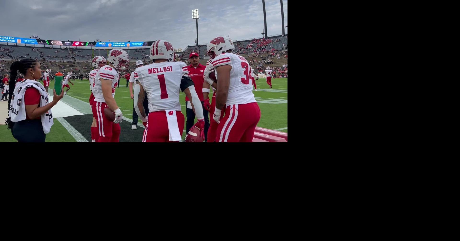 Badgers running backs going through ball security drills