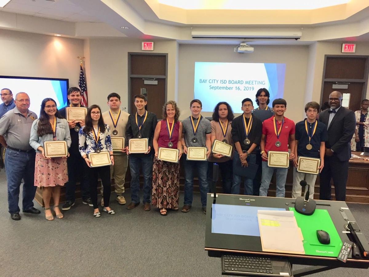 Trustees recognize students at board meeting