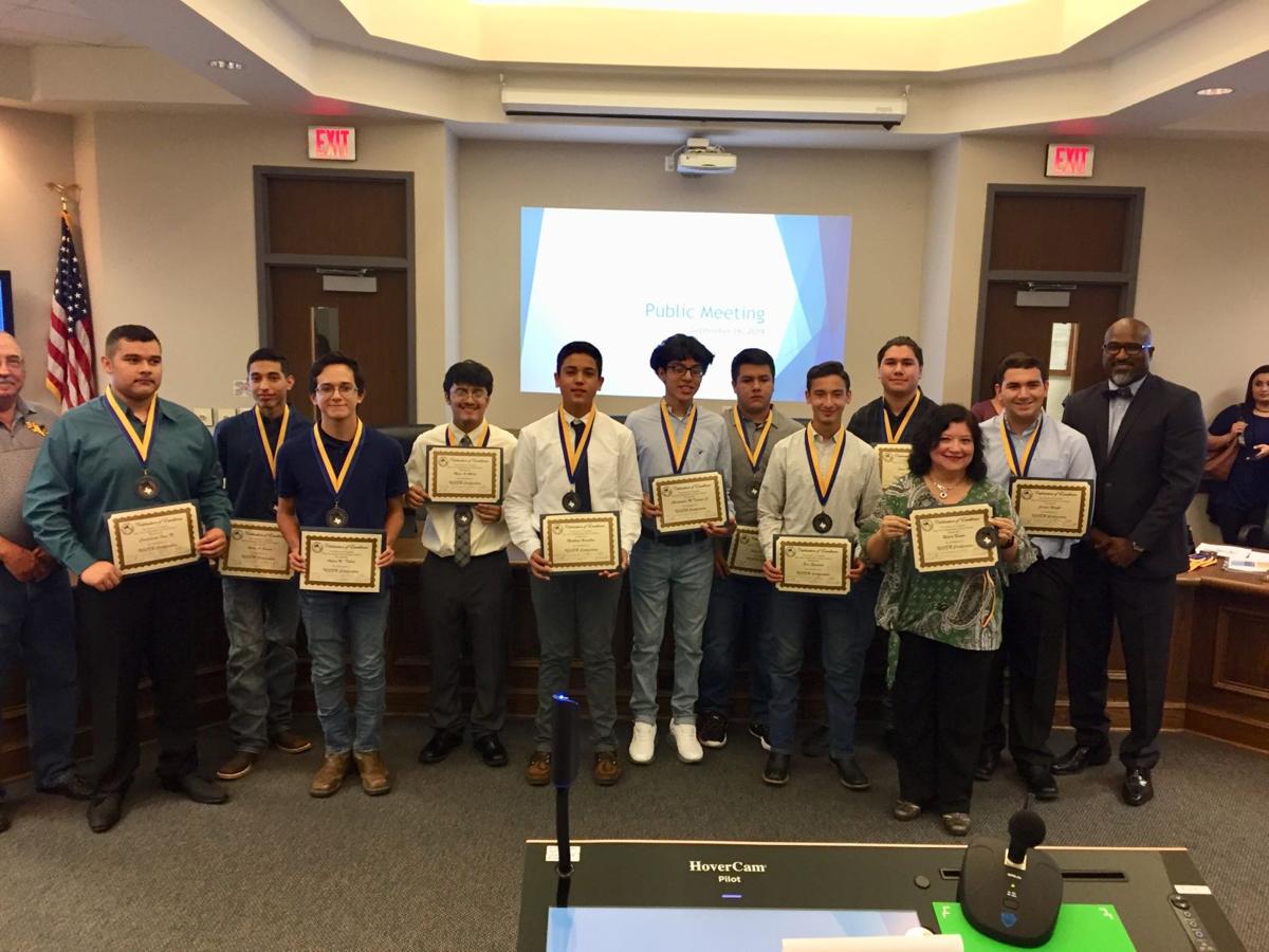 Trustees recognize students at board meeting