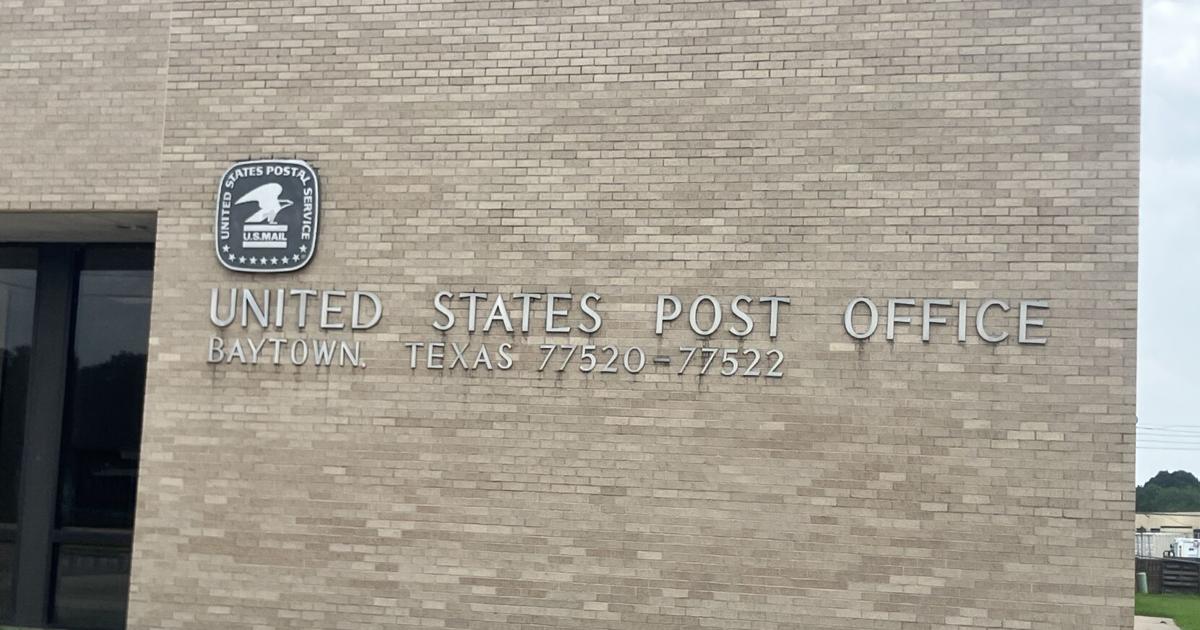 Postal supervisor charged in theft