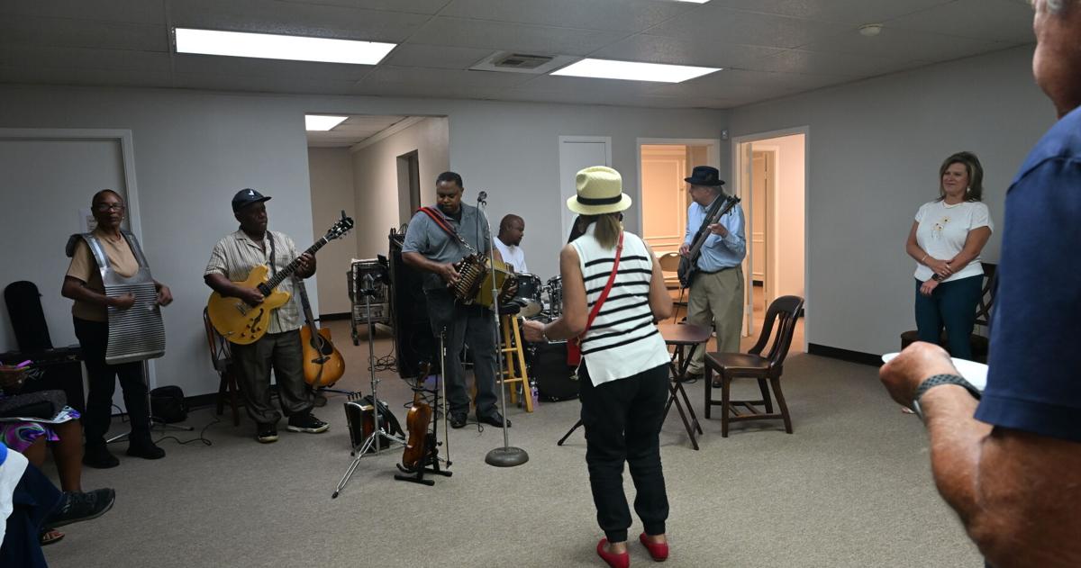 Friends meet at Baytown Sun Open House