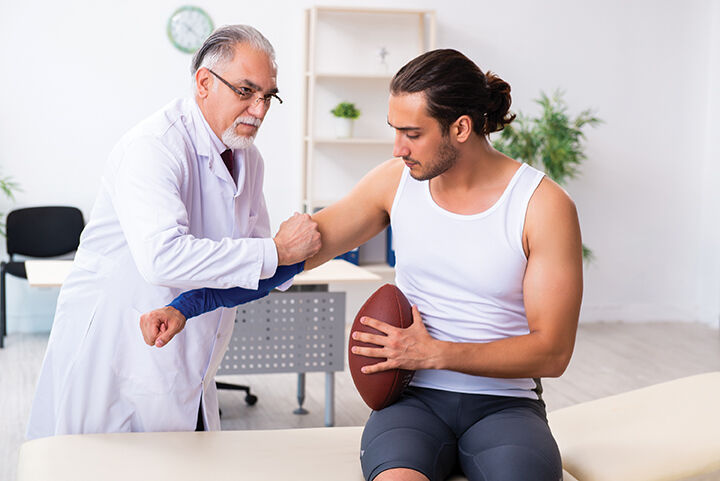 Young male patient visiting experienced doctor