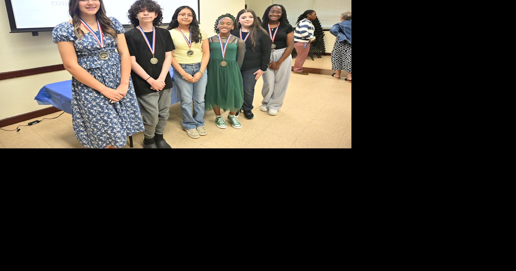 Rotarians hear winning essays from junior school stars