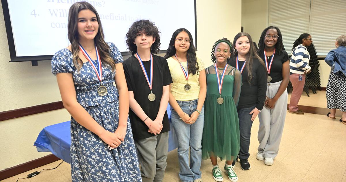 Rotarians hear winning essays from junior school stars