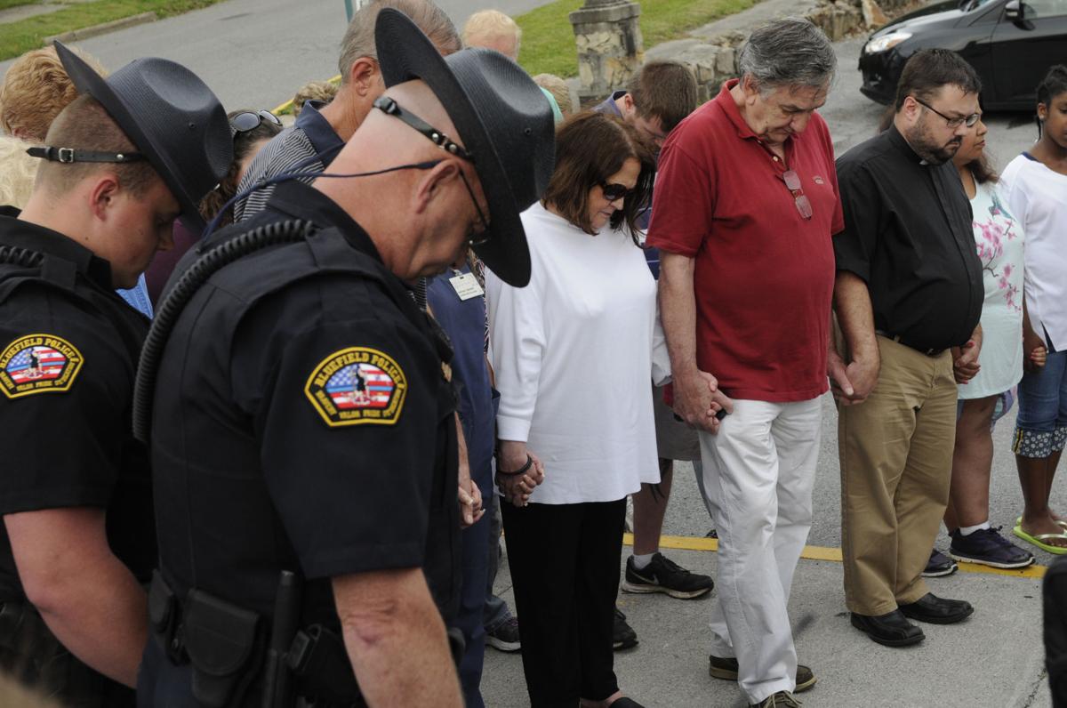 Slideshow Prayer vigil at the Bluefield Police Department Tuesday
