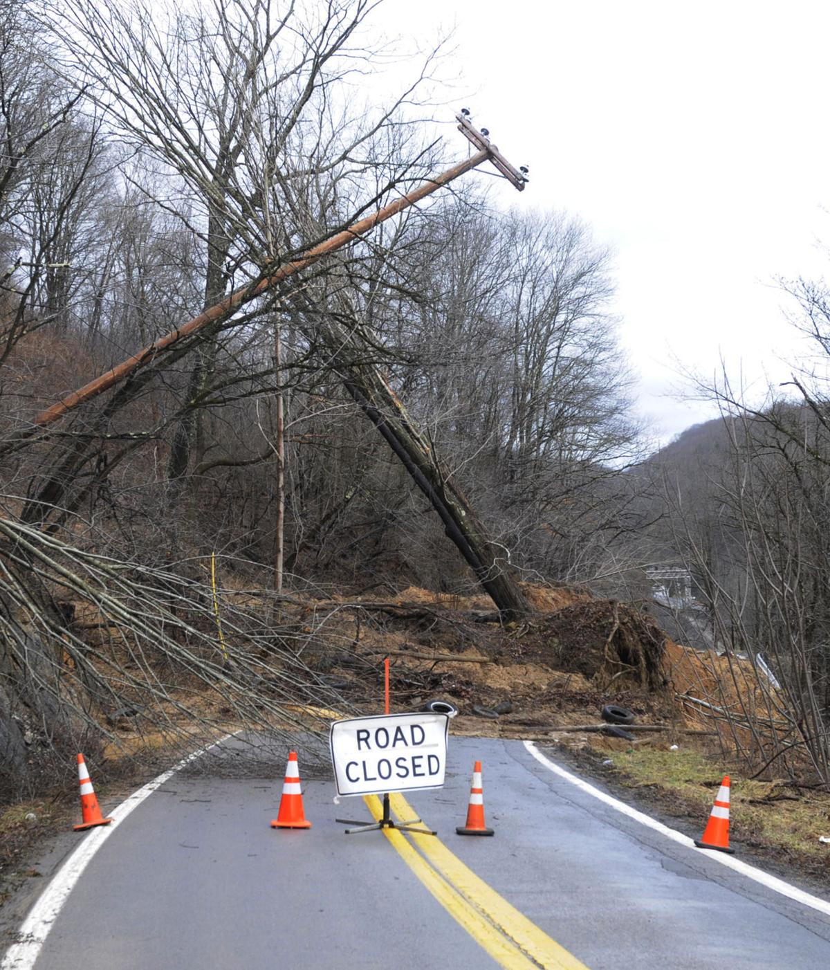 Landslide halts travel Heavy rains wash mud down onto Route 112