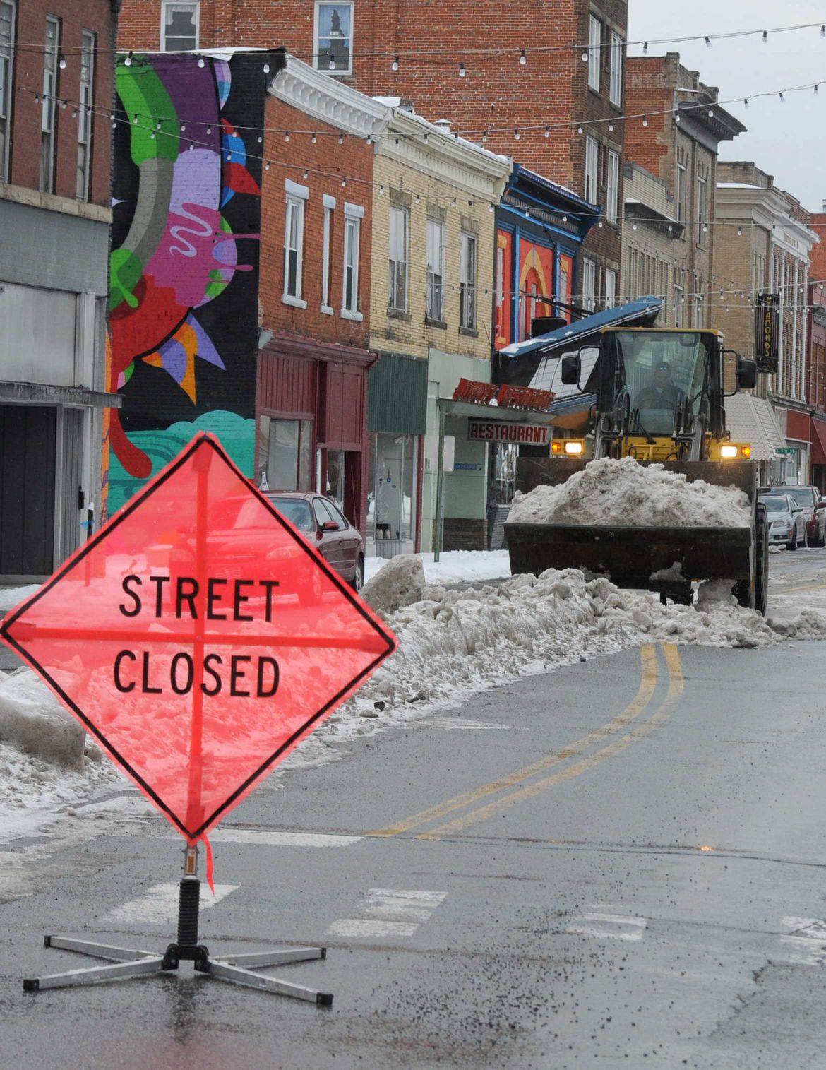 Slide Show Clearing Snow on Mercer Street, in Princeton Gallery
