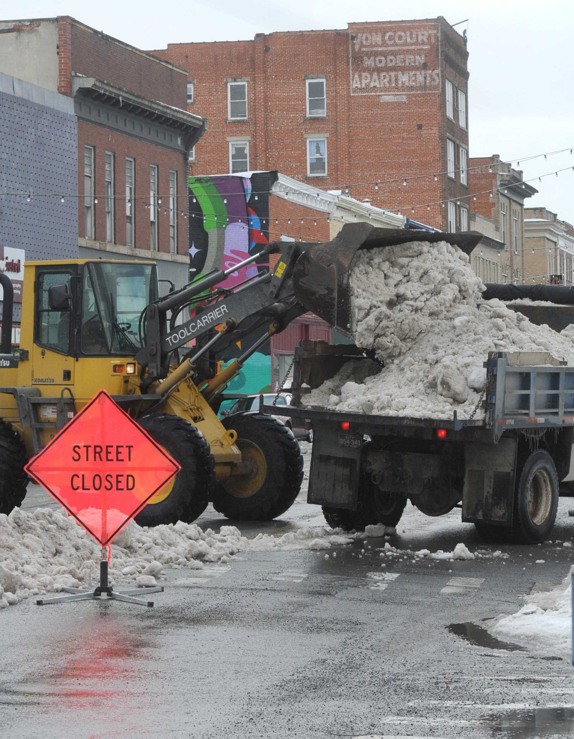 Slide Show Clearing Snow on Mercer Street, in Princeton Gallery